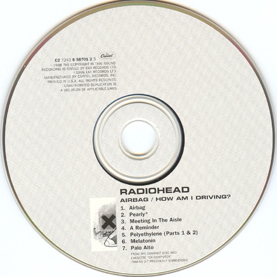 The disc, with the running order and the X (Capitol CD, later pressing)
