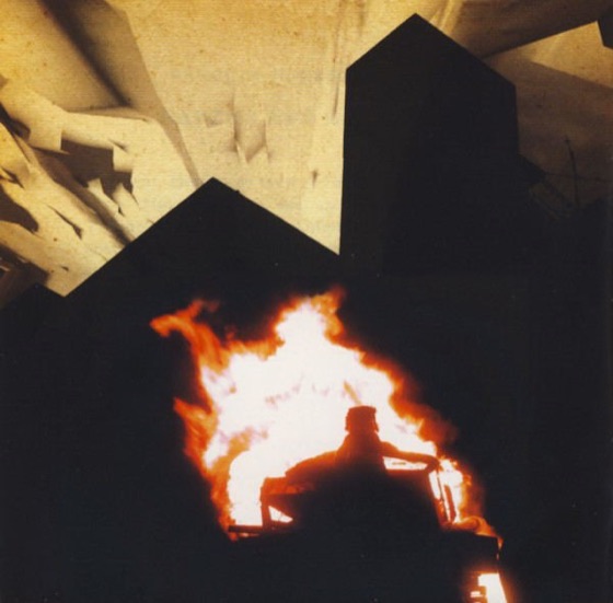 Booklet page: a fire among dark tower blocks (UK CD, 2001)
