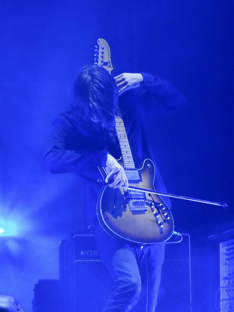 Jonny Greenwood bowing his guitar at Austin City Limits, 7 October 2016