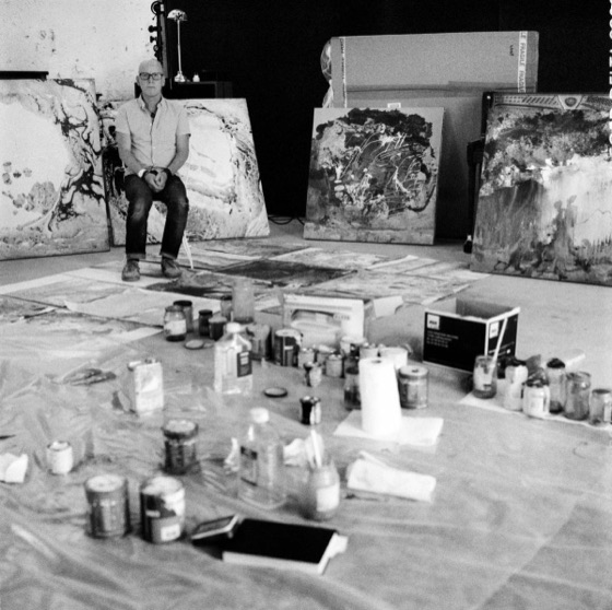 A painting room with canvases and paint tins, from the Library's A Moon Shaped Pool art gallery