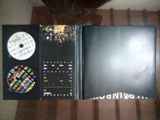 The two CDs in their slots inside the discbox’s hardback book (2007)