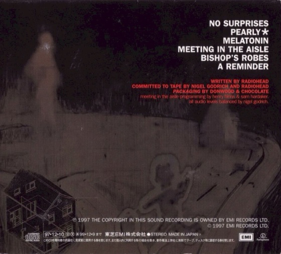 The back, with the running order and the Donwood & Chocolate credit (Toshiba-EMI, 1997)