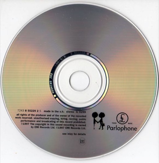 The disc, made in the UK, with the handshake figures (Parlophone, 1997)