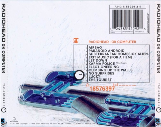 The back and spines, with “Fitter Happier” as a footnote to “Karma Police” (Parlophone, 1997)