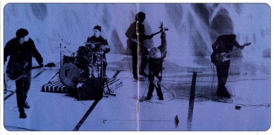 Booklet pages 4 and 5, the band on a bare floor (Parlophone, 1993)