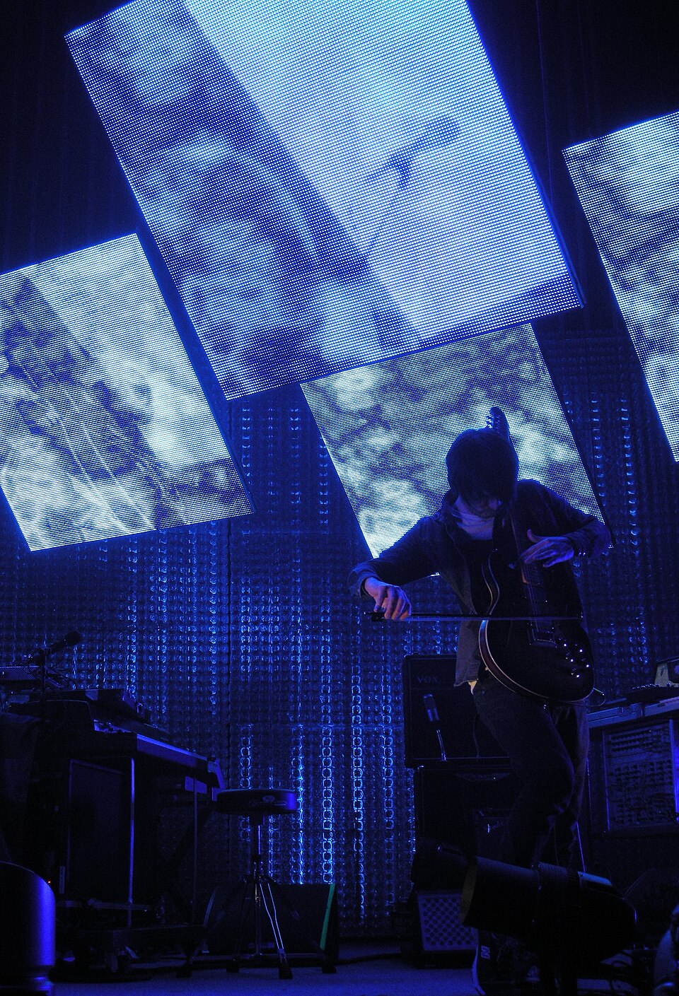 Jonny Greenwood playing guitar with a bow, Sprint Center, Kansas City, 11 March 2012