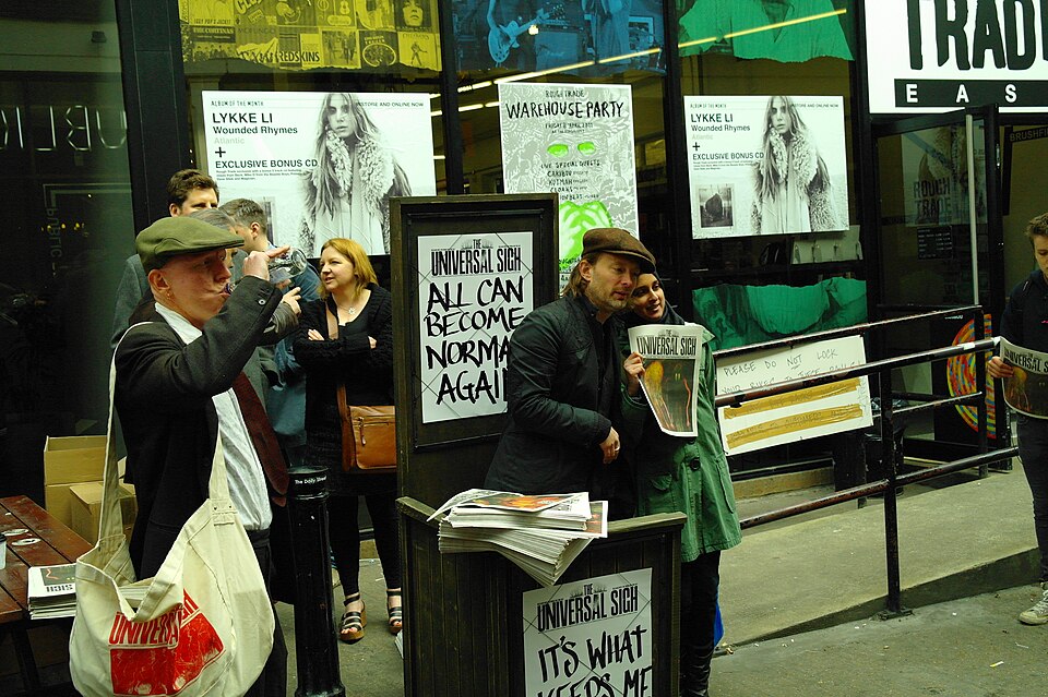 Thom Yorke handing out The Universal Sigh outside Rough Trade East, London, March 2011