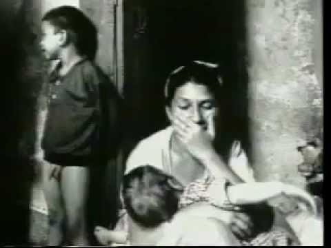 A still from the video: The promo from 1995, made for War Child's HELP album: the band at the session, cut with footage of the war in Bosnia. A fan's copy.