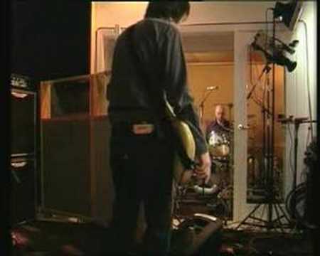 still from the video: “reckoner”, its first time live, thumbs down 2007