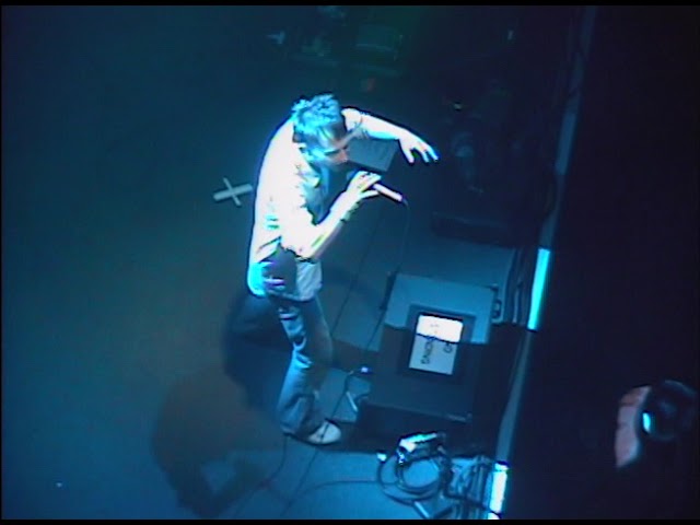 A still from the video: A live take.