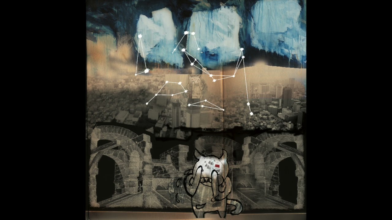 A still from the video: Thom Yorke alone, acoustic, to an empty room.
